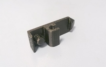 Крючок тонерной тубы KonikaMinolta